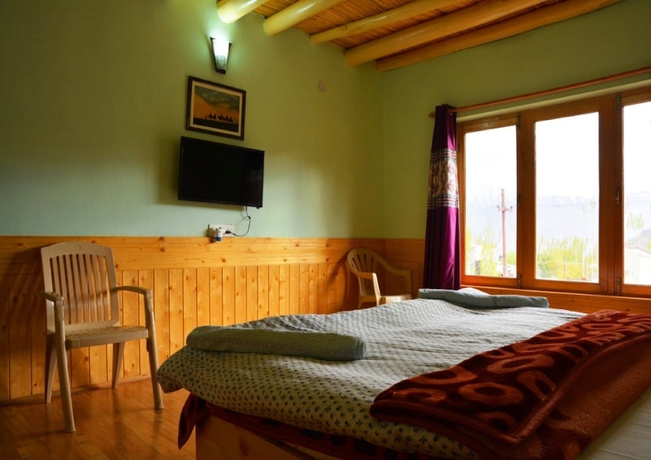 Imagen de la habitación del Hotel TIH Khushu Guest House. Foto 7