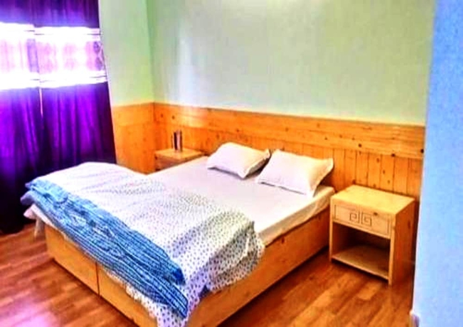 Imagen de la habitación del Hotel TIH Khushu Guest House. Foto 8