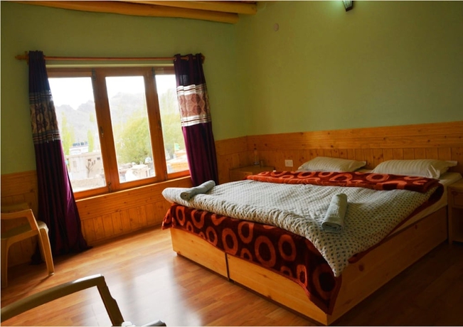 Imagen de la habitación del Hotel TIH Khushu Guest House. Foto 9