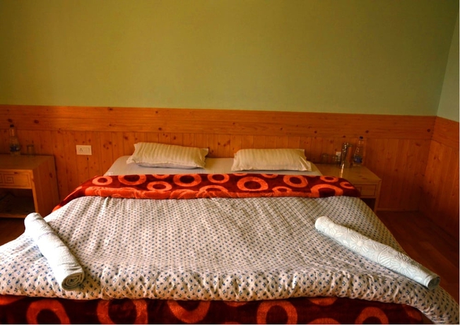 Imagen de la habitación del Hotel TIH Khushu Guest House. Foto 10