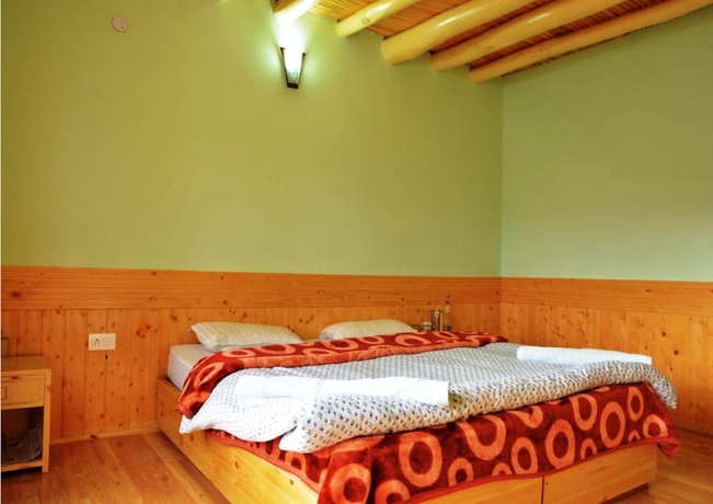 Imagen de la habitación del Hotel TIH Khushu Guest House. Foto 11