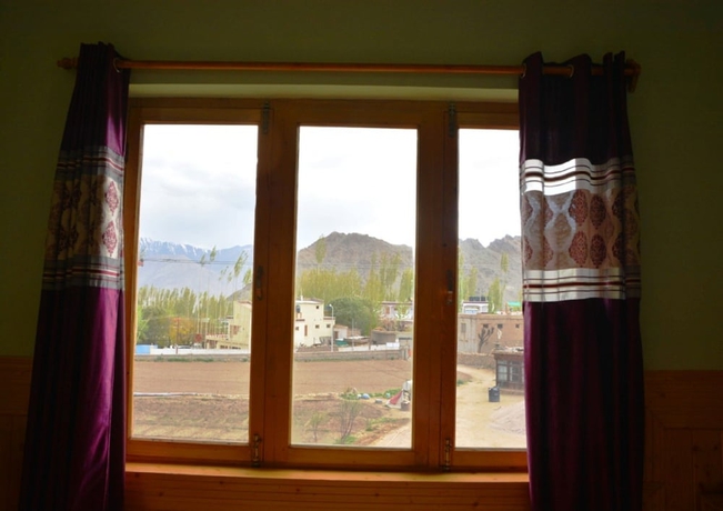 Imagen de la habitación del Hotel TIH Khushu Guest House. Foto 12