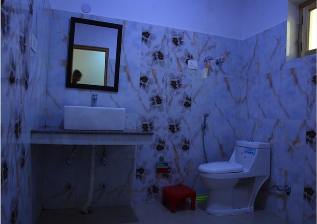 Imagen de la habitación del Hotel TIH Khushu Guest House. Foto 14
