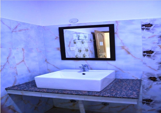 Imagen de la habitación del Hotel TIH Khushu Guest House. Foto 15