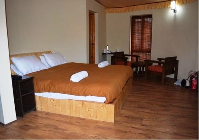 Imagen general del Hotel TIH Mystique Meadows Earth Homes. Foto 3