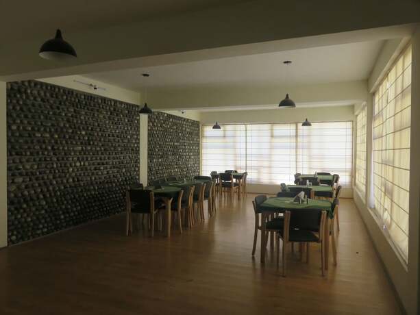 Imagen general del Hotel TIH Mystique Meadows Earth Homes. Foto 7