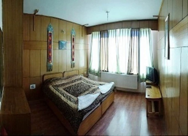 Imagen de la habitación del Hotel TIH Panorama. Foto 15