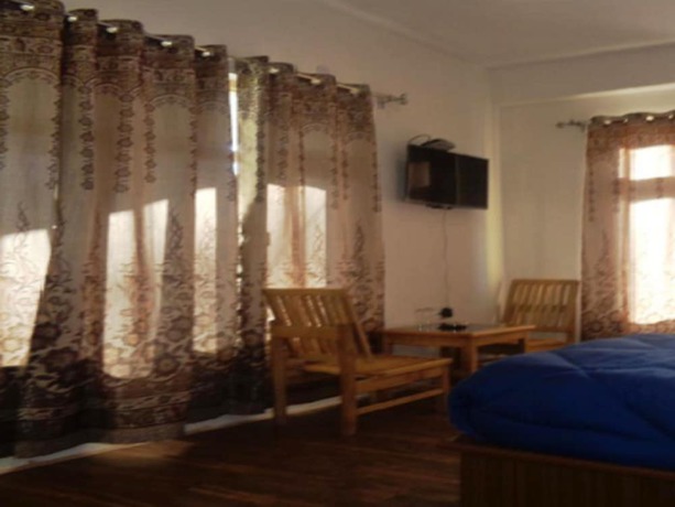 Imagen de la habitación del Hotel TIH Wang Residency. Foto 6