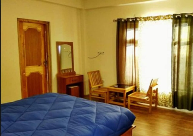 Imagen de la habitación del Hotel TIH Wang Residency. Foto 10