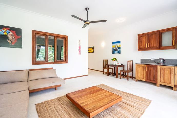 Imagen de la habitación del Hotel TIKI Beach Club and Resort. Foto 5