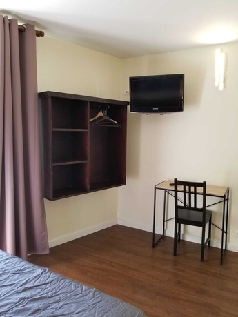 Imagen de la habitación del Hotel TINGIS, París. Foto 4