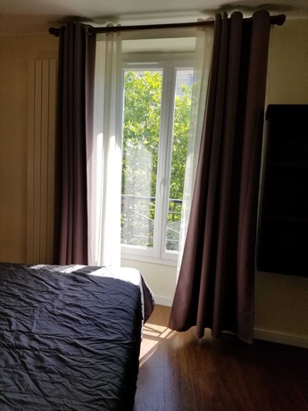 Imagen de la habitación del Hotel TINGIS, París. Foto 5