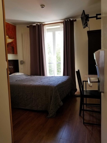 Imagen de la habitación del Hotel TINGIS, París. Foto 10