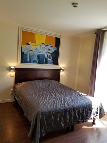 Imagen de la habitación del Hotel TINGIS, París. Foto 12