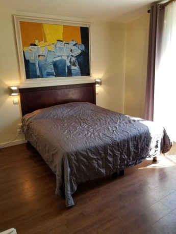 Imagen de la habitación del Hotel TINGIS, París. Foto 14