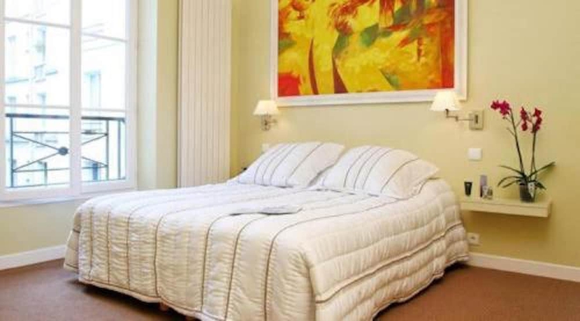 Imagen de la habitación del Hotel TINGIS, París. Foto 17