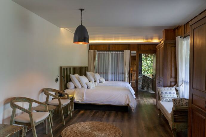 Imagen de la habitación del Hotel TIRA VILAGNA SUITES and SPA. Foto 11