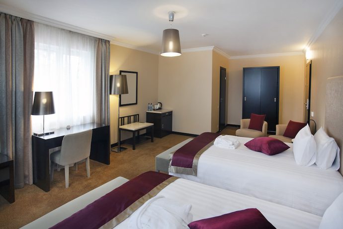 Imagen de la habitación del Hotel TISHINA Boutique. Foto 2