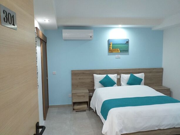 Imagen de la habitación del Hotel TJ Boutique Accommodation. Foto 17