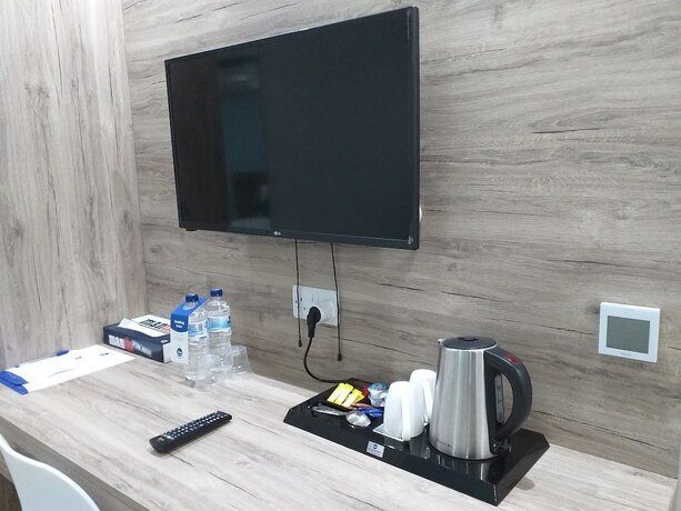 Imagen de la habitación del Hotel TJ Boutique Accommodation. Foto 19