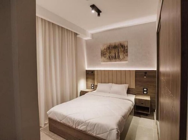 Imagen de la habitación del Hotel TK Suites. Foto 10