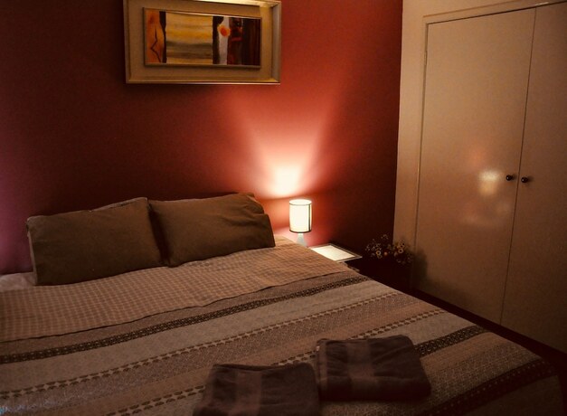 Imagen de la habitación del Hotel TL Warmest Homestay. Foto 11