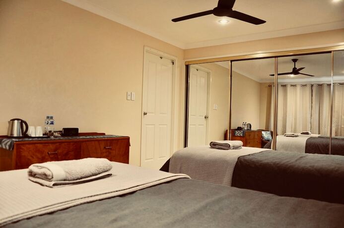 Imagen de la habitación del Hotel TL Warmest Homestay. Foto 13