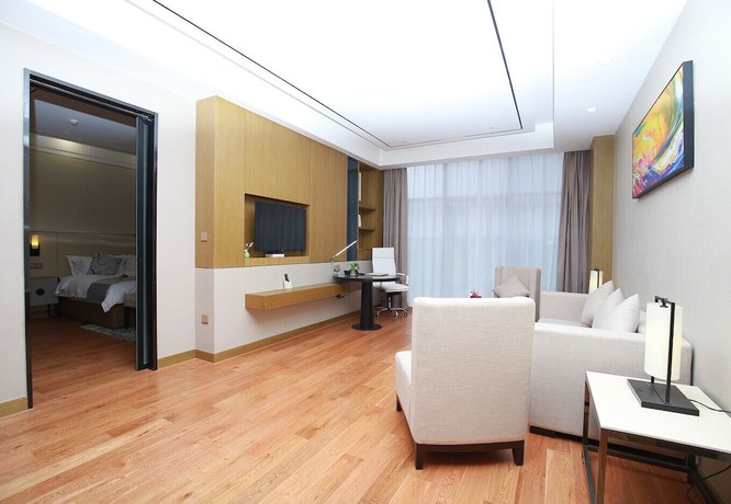 Imagen de la habitación del Hotel T-LAND Hotel Suzhou. Foto 12