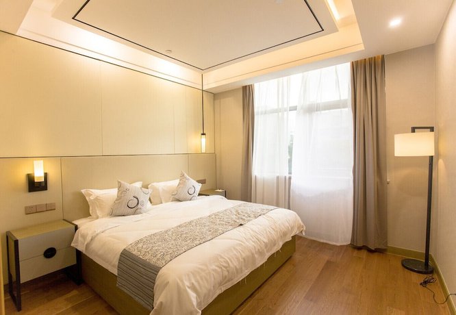 Imagen de la habitación del Hotel T-LAND Hotel Suzhou. Foto 16