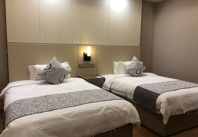 Imagen de la habitación del Hotel T-LAND Hotel Suzhou. Foto 17
