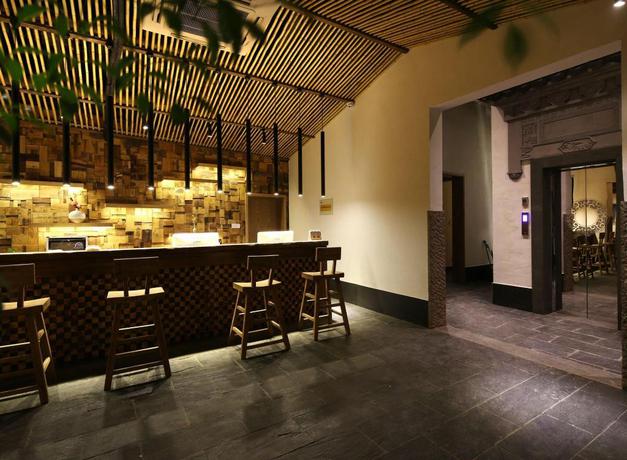 Imagen de los interiores del Hotel TONGXIANG WUZHEN YUEXIANG INN, Huangjiadi. Foto 12