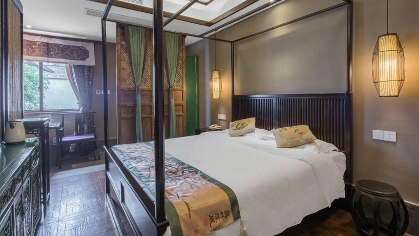 Imagen de la habitación del Hotel TONGXIANG WUZHEN YUEXIANG INN, Huangjiadi. Foto 1