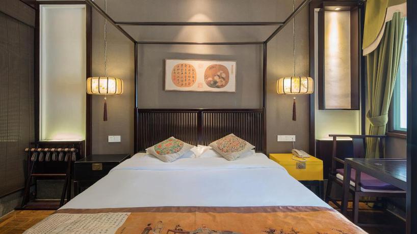 Imagen de la habitación del Hotel TONGXIANG WUZHEN YUEXIANG INN, Huangjiadi. Foto 2