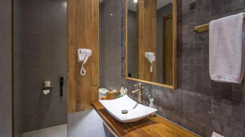 Imagen de la habitación del Hotel TONGXIANG WUZHEN YUEXIANG INN, Huangjiadi. Foto 8