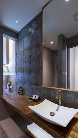Imagen de la habitación del Hotel TONGXIANG WUZHEN YUEXIANG INN, Huangjiadi. Foto 10