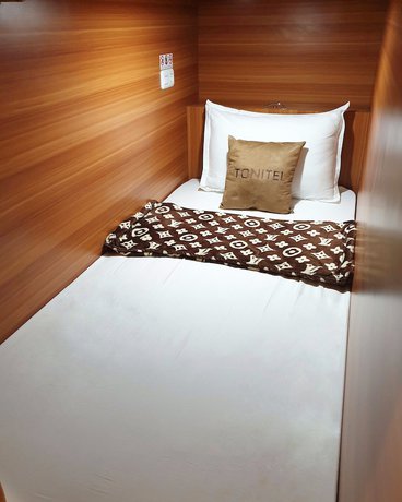 Imagen de la habitación del Hotel TONITEL Malioboro Yogyakarta - Hostel. Foto 11