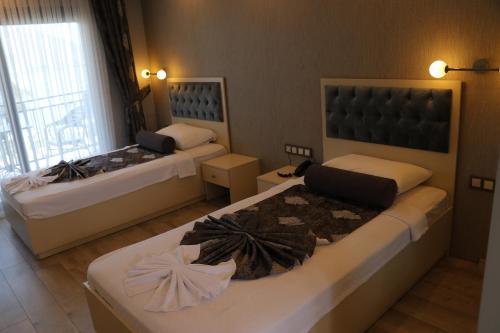 Imagen de la habitación del Hotel TOROS DELUXE RESORT HOTEL. Foto 14