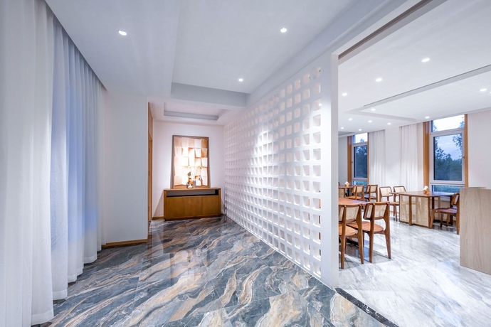 Imagen de los interiores del Hotel TOTOLO Winery Vacation Homestay. Foto 13