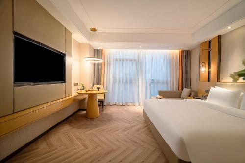 Imagen general del Hotel TOWO Shangpin International. Foto 1