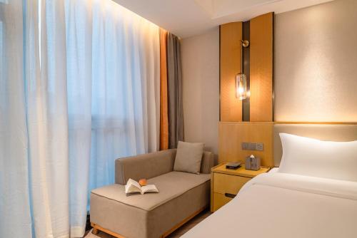 Imagen general del Hotel TOWO Shangpin International. Foto 2