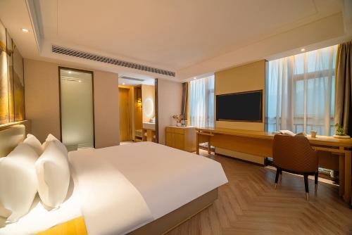 Imagen de la habitación del Hotel TOWO Shangpin International. Foto 18