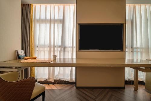 Imagen general del Hotel TOWO Shangpin International. Foto 11