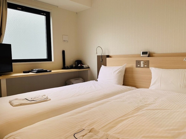 Imagen de la habitación del Hotel TOYOTOMI INN NAMBAKOZU. Foto 11