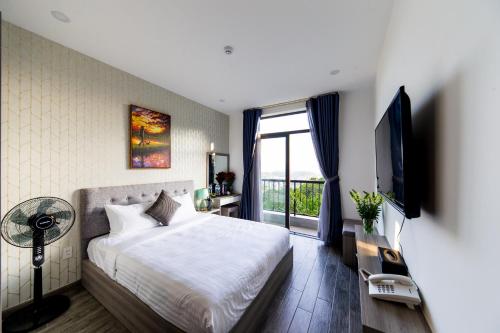 Imagen de la habitación del Hotel TP Pineview Dalat. Foto 19