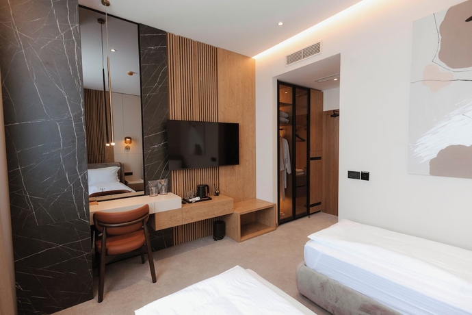 Imagen de la habitación del Hotel TRADICIJA HOTEL. Foto 10