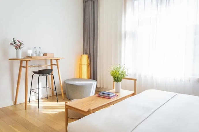 Imagen de la habitación del Hotel TRANQUIL HOUSE. Foto 8