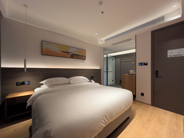 Imagen de la habitación del Hotel TRAVEL TREE INN. Foto 2