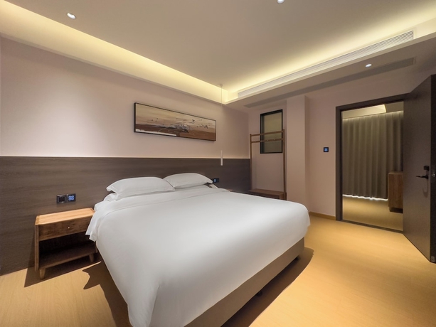 Imagen de la habitación del Hotel TRAVEL TREE INN. Foto 3