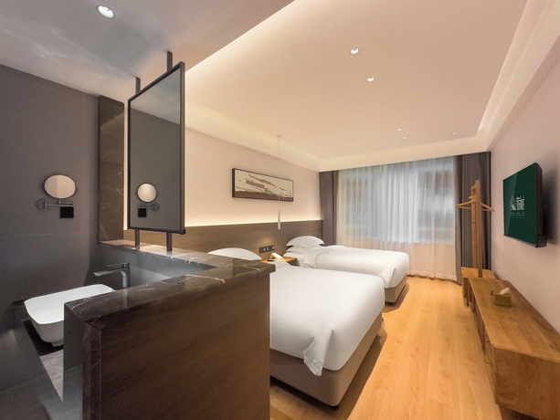 Imagen de la habitación del Hotel TRAVEL TREE INN. Foto 4
