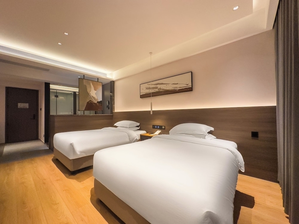 Imagen de la habitación del Hotel TRAVEL TREE INN. Foto 5